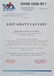 List gratulacyjny z okazji 40-lecia SP-13 w Żorach - Na białym tle czarny napis, na dole pieczęci i podpisy przedstawicieli instytucji- 